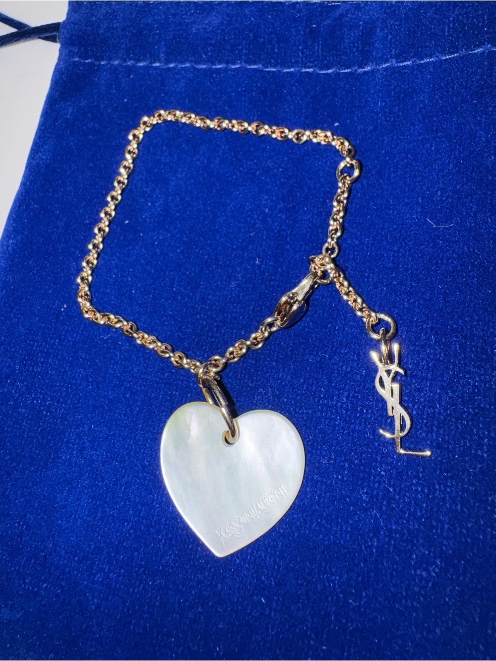 Yves Saint Laurent chain link bracelet YSL and mother of pearl heart charm
